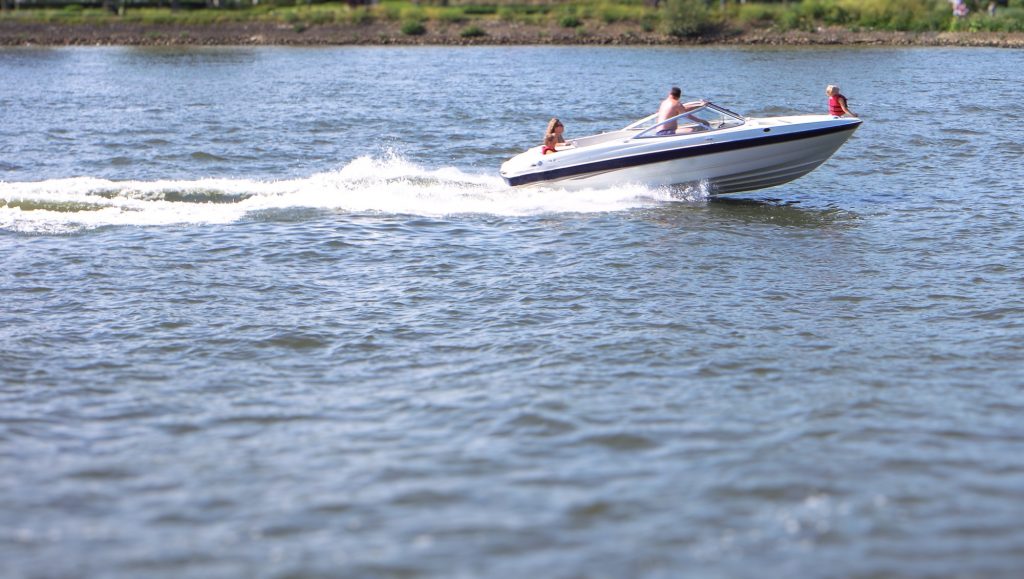 Family fun on the water with the speed boat.